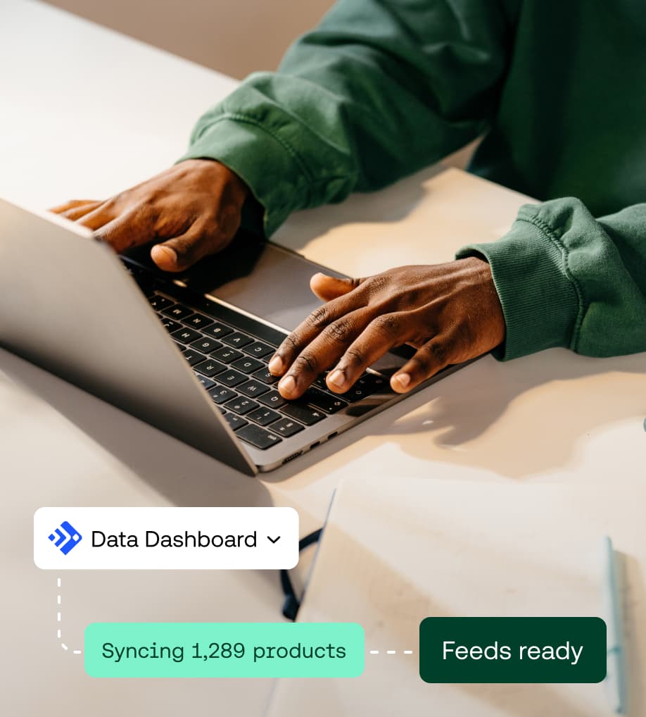 A team collaborating around a laptop with UI overlays for a Data Dashboard showing syncing data and feeds launched.